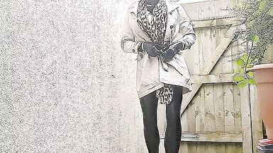 Alison outside in tight black rubber - 4 image