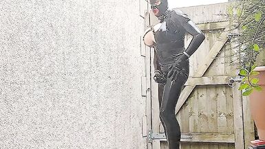 Alison outside in tight black rubber - 7 image