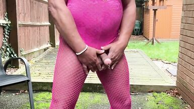 Crossdresser kellycd2022 in pink playsuit and fishnets - 13 image