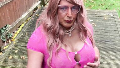 Crossdresser kellycd2022 in pink playsuit and fishnets
