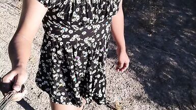 Beautiful ladyboy in mini dress and sandals walks in very hot