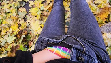 cumming outside in the fall leaves - 1 image