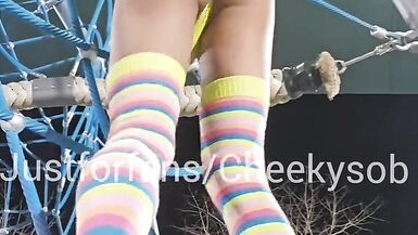 Femboy in thong and toesocks teases in public
