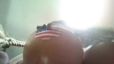 Blonde tranny strokes cock wearing silver lingerie. - 5 image