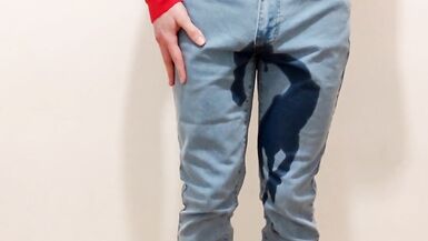 Tiny crossdresser pee in his jeans - 2 image