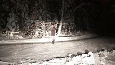 Real Non-Professional Female Masker Wearing Boots, Taut Darksome Suit in various Locations in Winter - 11 image