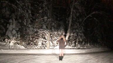 Real Non-Professional Female Masker Wearing Boots, Taut Darksome Suit in various Locations in Winter - 9 image