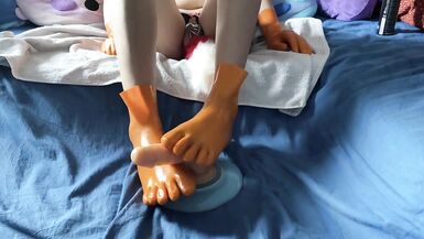 Latex Sissy gives Vibrator Footjob - 5 image