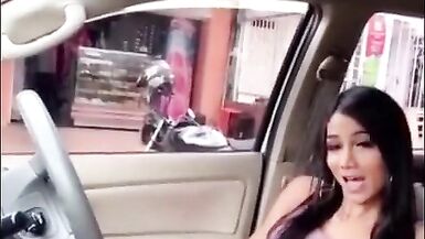 that babe is a very excited t-girl stroking it in the car and busted