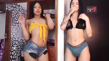 Two Tranny traps dancing and smoking a cigarrete - 4 image