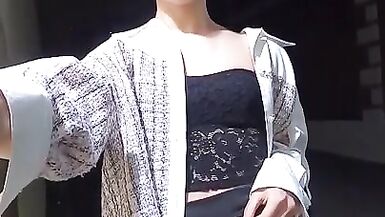 very cute chinese CD walking the streets at night