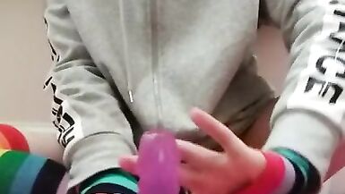 Femboy in Rainbow Thighhighs and Chastity Cage uses 6 Inch Dildo in the Ass