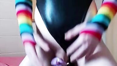 Rainbow Femboy in a Chastity Cage and Shiny Leotard Rides a BBC Dildo - 14 image