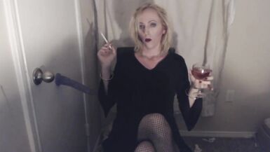 Goth Tranny Smokes and Pleasures Herself.