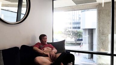 FTM Masturbates in Public Lounge next to Window - 13 image