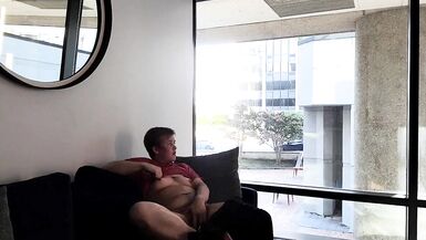 FTM Masturbates in Public Lounge next to Window - 15 image