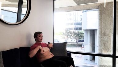 FTM Masturbates in Public Lounge next to Window - 4 image