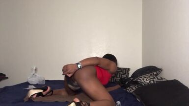 Ebony CD Enjoys Dildo in Heels - 1 image