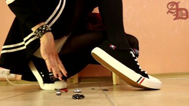 TRANNY GIANTESS CRUSHES SMALL CARS IN SNEAKERS, BLACK PANTYHOSE AND MINI SKIRT (CRUSH/FOOT FETISH) - 1 image