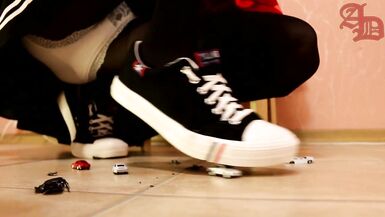 TRANNY GIANTESS CRUSHES SMALL CARS IN SNEAKERS, BLACK PANTYHOSE AND MINI SKIRT (CRUSH/FOOT FETISH) - 7 image